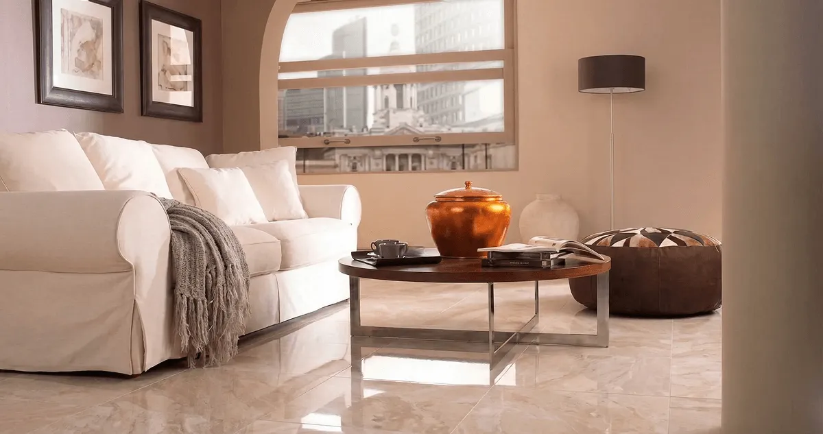 Modern living room with professionally installed marble flooring, a beige sofa, coffee table in Little Rock, AR